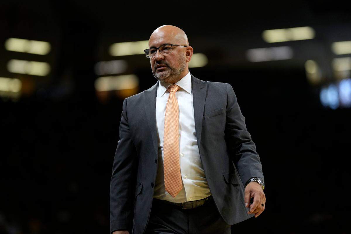 Bowling Green State head coach Fred Chmiel watches from the bench during the first half of an NCAA college basketball game against Iowa on Dec. 2 in Iowa City, Iowa.