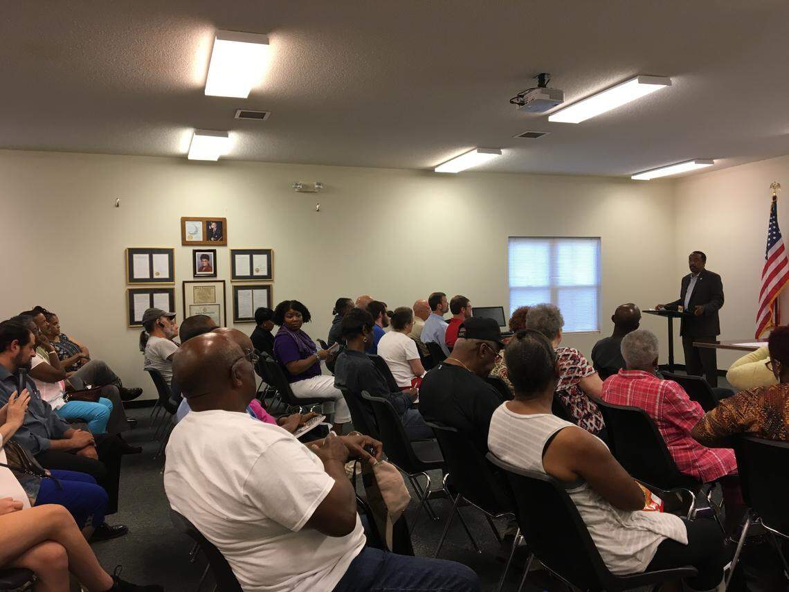 A crowd of about 100 people learned Thursday night that federal officials will reopen a review of the Westinghouse nuclear fuel factory in the wake of news about leaks at the facility near Columbia.