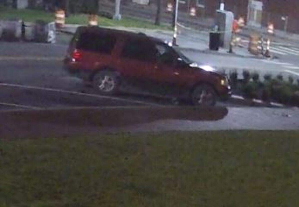 The Florence Police Department is looking for the owner/operator of this red Ford Expedition, who is a person of interest in the vandalism of a fountain.