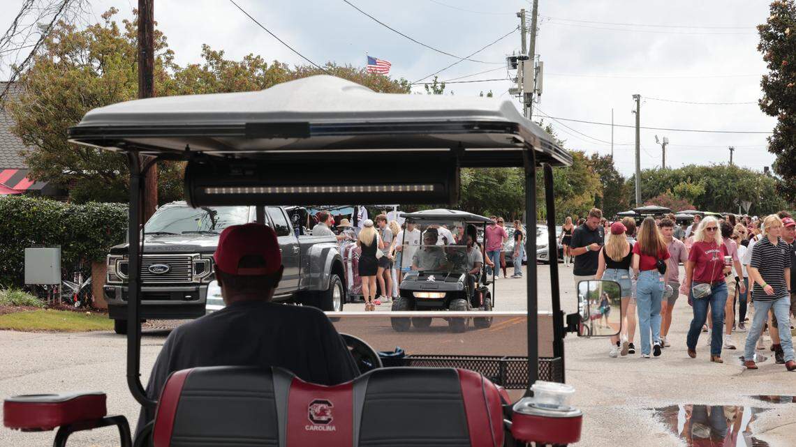 Golf carts buzz around Williams-Brice Stadium and surrounding parking lots  before USC’s game against Missouri on Saturday, Nov. 16, 2024