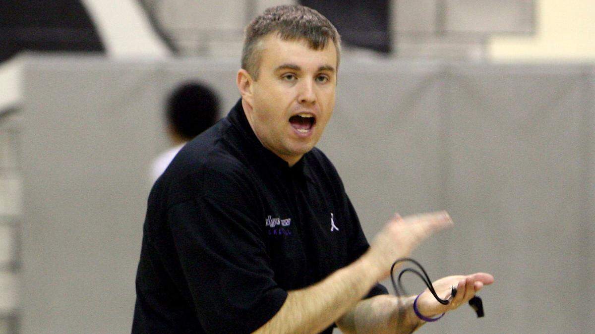 John Combs encourages his team during practice on Wednesday, Combs leads his Ridge View Blazers to the Class 4A state championships Friday.