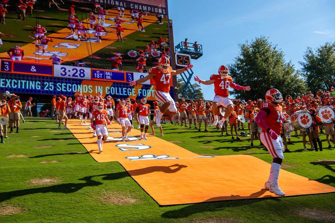 Clemson players run down the hill before their game against Syracuse at Memorial Stadium in Clemson, S.C. on Oct. 24, 2020.