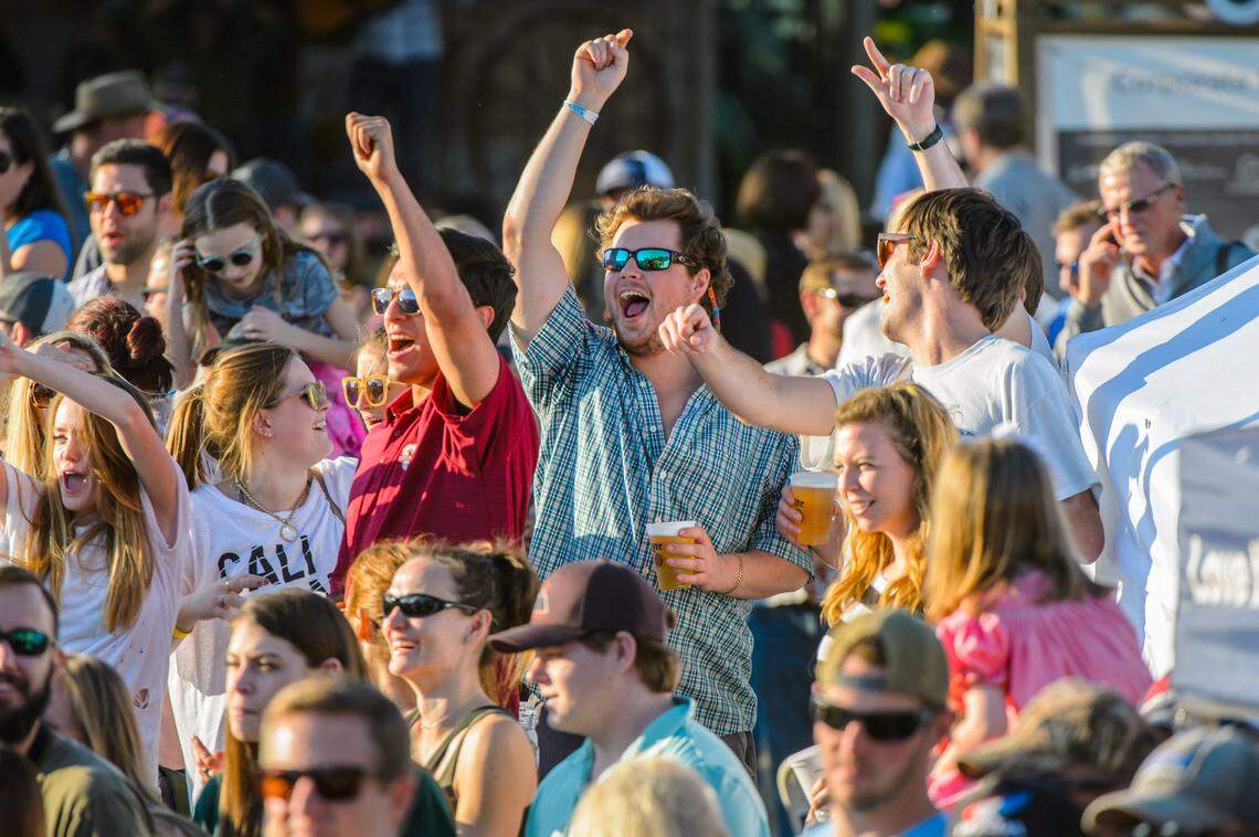 A crowd cheers at the Southeastern Wildlife Exposition in Charleston, S.C. The popular 3-day festival is expected to return Feb. 17-20, after the pandemic forced organizers to cancel the event in 2021.