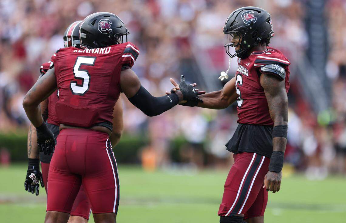 South Carolina edge Dylan Stewart (6) is congratulated by edge Kyle Kennard (5) following a sack during the first half of the Gamecocks’ season opener against Old Dominion in Columbia on Saturday, August 31, 2024.