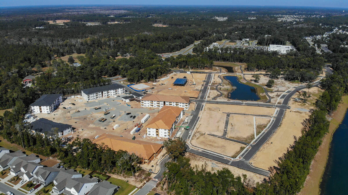 Construction continues on New Riverside Village on Friday, Nov. 4, 2022 near the Bluffton traffic circle at SC. 170 and May River Rd in Bluffton. The developers website says the village will be comprised of 38,500-square-feet of commercial space with townhomes and apartments.