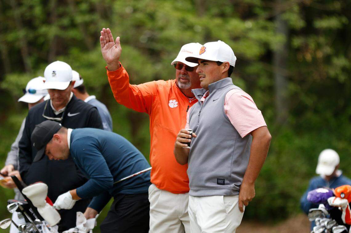 Larry Penley speaks with Bryson Nimmer during the 2019 ACC Men’s Golf Championship in New London, North Carolina.