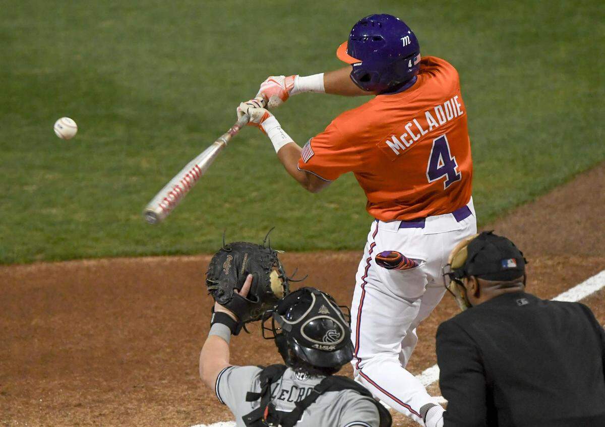Clemson infielder Tryston McCladdie (4) bats against during the bottom of the first inning at Doug Kingsmore Stadium in Clemson, S.C. Friday, February 28, 2025.