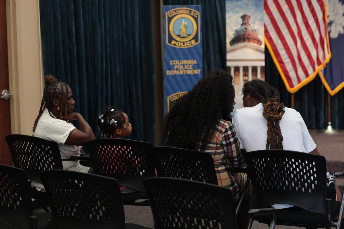 The family of Angela Fuller sits in the front row during a news conference held by Columbia Police Chief Skip Holbrook on Sept. 18, 2025.