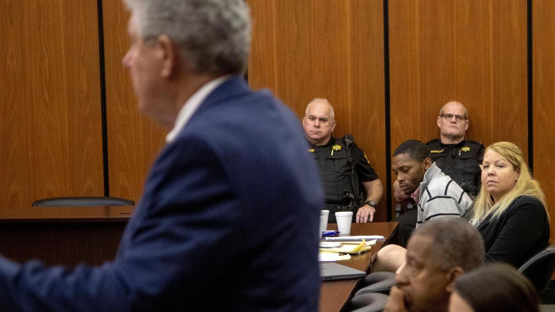 Troy Stevenson, center, sits next to his attorney, Aimee Zmroczek, during court proceedings in Richland County Circuit Court Friday Dec. 14, 2018, in Columbia, SC.