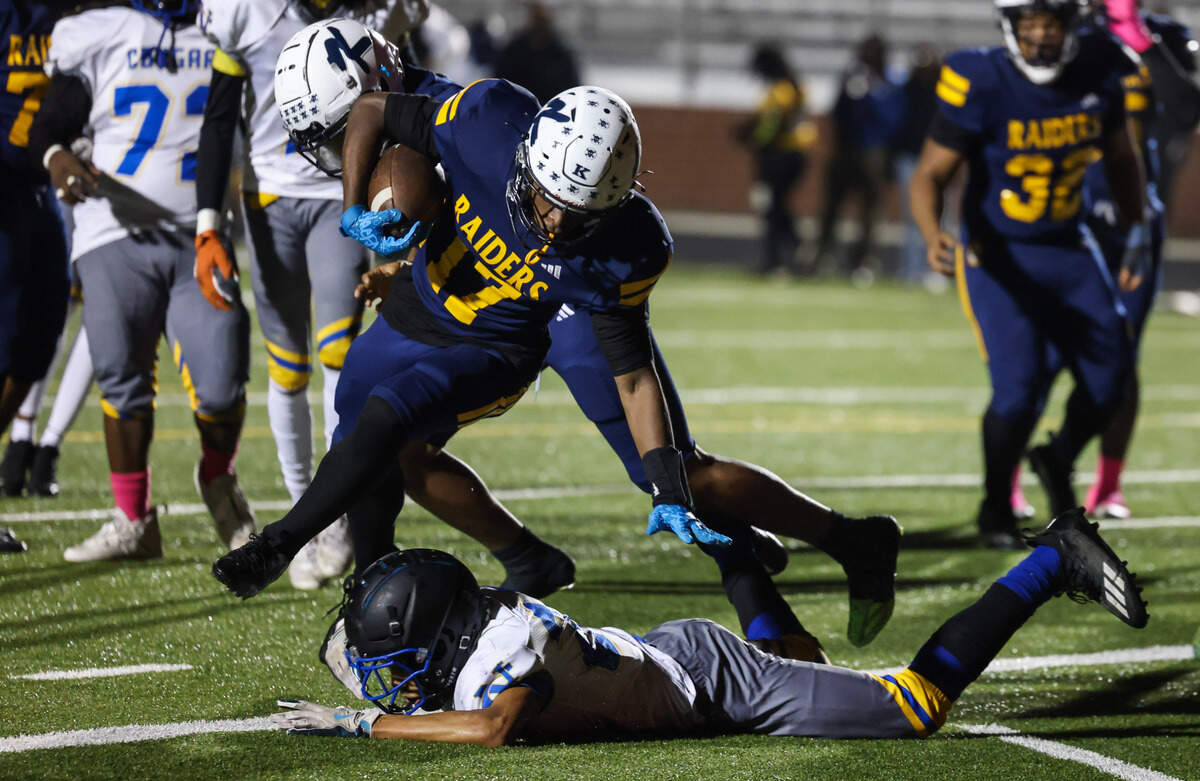 Darius Dixon (17) of Keenan scores a two-point conversion during the first half of Keenan’s game against North Charleston in the first round of Class 3A playoffs in Columbia on Friday, November 15, 2024.