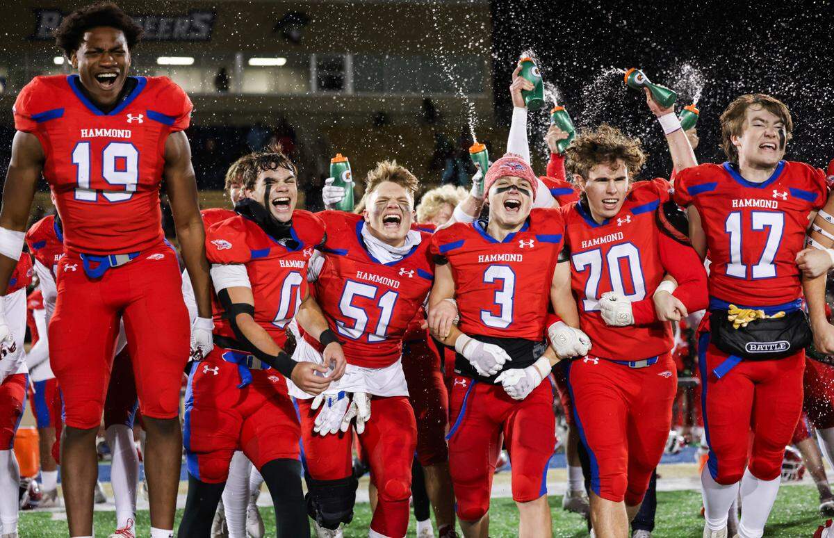 Hammond players celebrate their win following the SCISA Class 4A championship game between Hammond and Porter-Gaud at Charleston Southern in North Charleston on Friday, November 22, 2024.