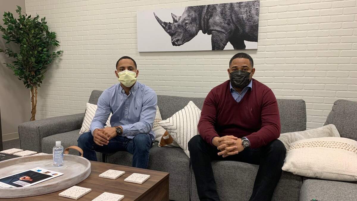 CEO Lance Brown and COO Elliot Haney sit inside their office at Rhino Medical Supply in Columbia, S.C., a company they started during the coronavirus pandemic.