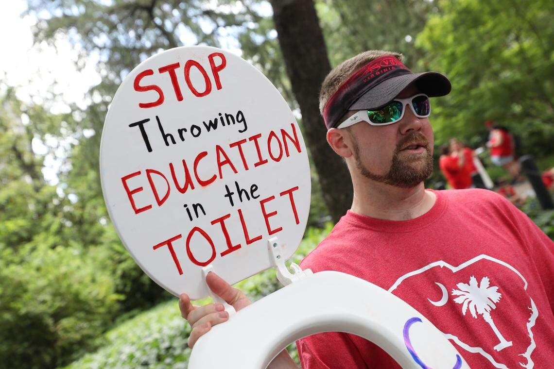 Steve Baughman, a teacher from Lancaster, holds a sign he made for the SC for Ed Teacher’s Rally at the South Carolina State House. An estimated 10,000 teachers and supporters attended the rally to push for widespread change in the state education system. 5/1/19
