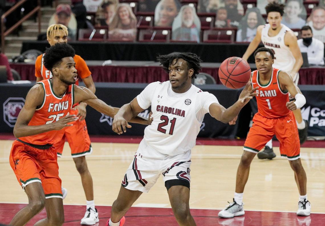 South Carolina Gamecocks forward Ja’Von Benson (21) passes the ball as Florida A&M defends at Colonial Life Arena on January 2, 2021.