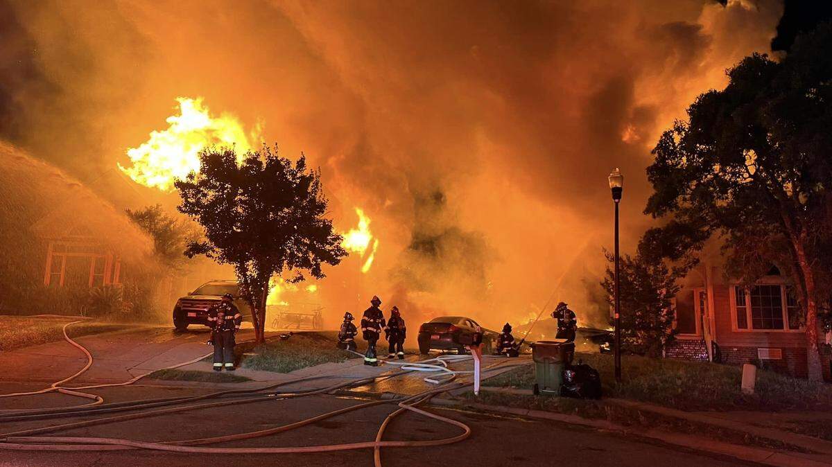 Members of the Columbia Fire Department battle a 2-Alarm fire.