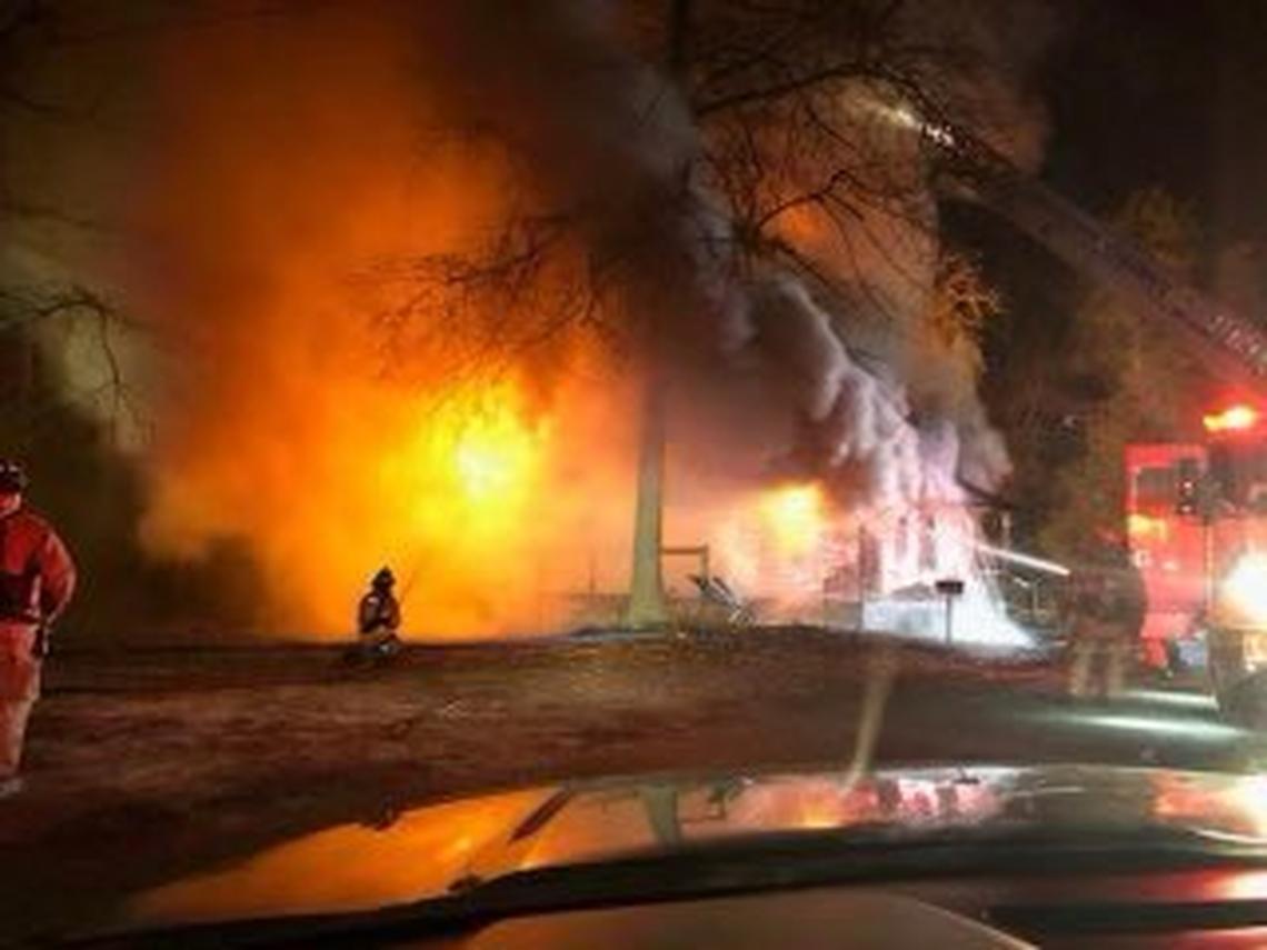 Fire fighters battle a burning building in Lexington County.