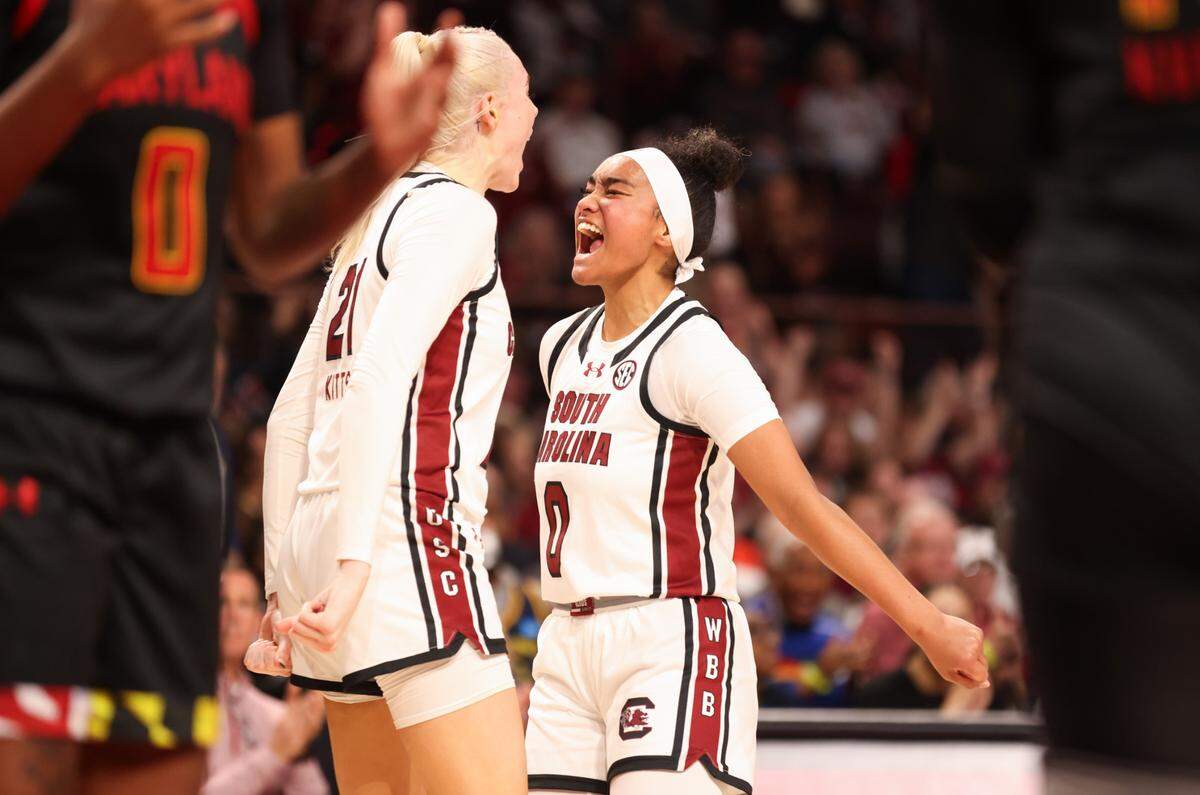 South Carolina guard Te-Hina Paopao (0) celebrates a basket with teammate forward Chloe Kitts (21) during the first half of the Gamecocks’ game against the visiting Terrapins at Colonial Life Arena on Sunday, November 12, 2023.