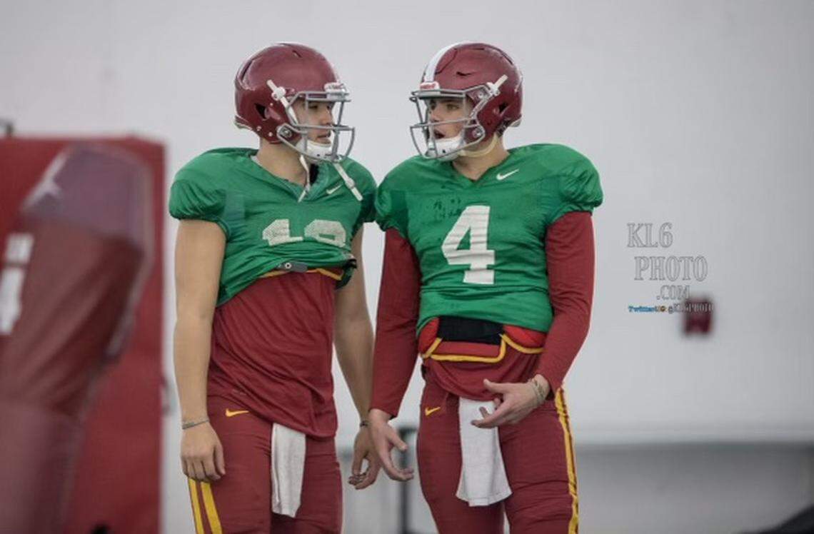 Zeb Noland, right, and Kyle Starcevich talk during an Iowa State football practice. Noland spent three years at ISU before transfering to North Dakota State.