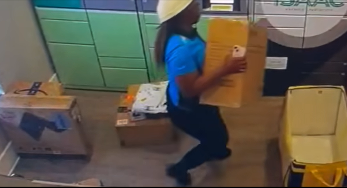 Video shows the driver examined multiple packages before picking a large one to put in her car, officials say.