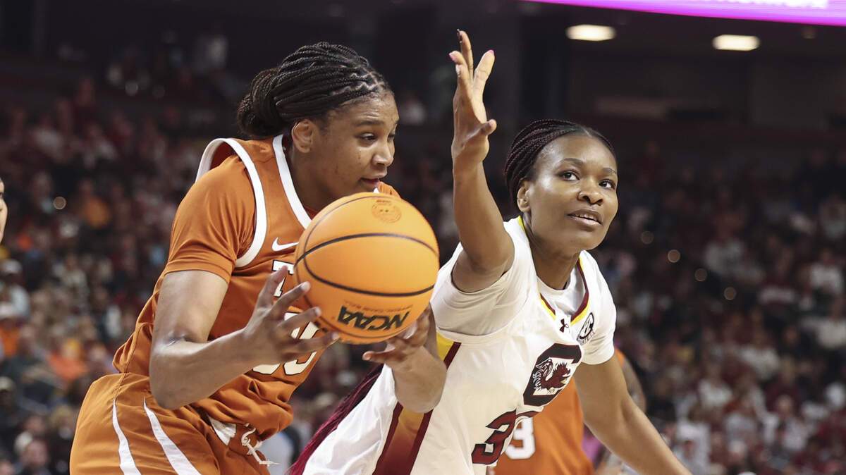 South Carolina's Maryam Dauda (30) tries for a rebound with Texas’s Madison Booker (35) during the first half of action of their women's basketball game in the SEC Tournament, against Texas at the Bon Secours Wellness Arena on Sunday, March 8, 2026.