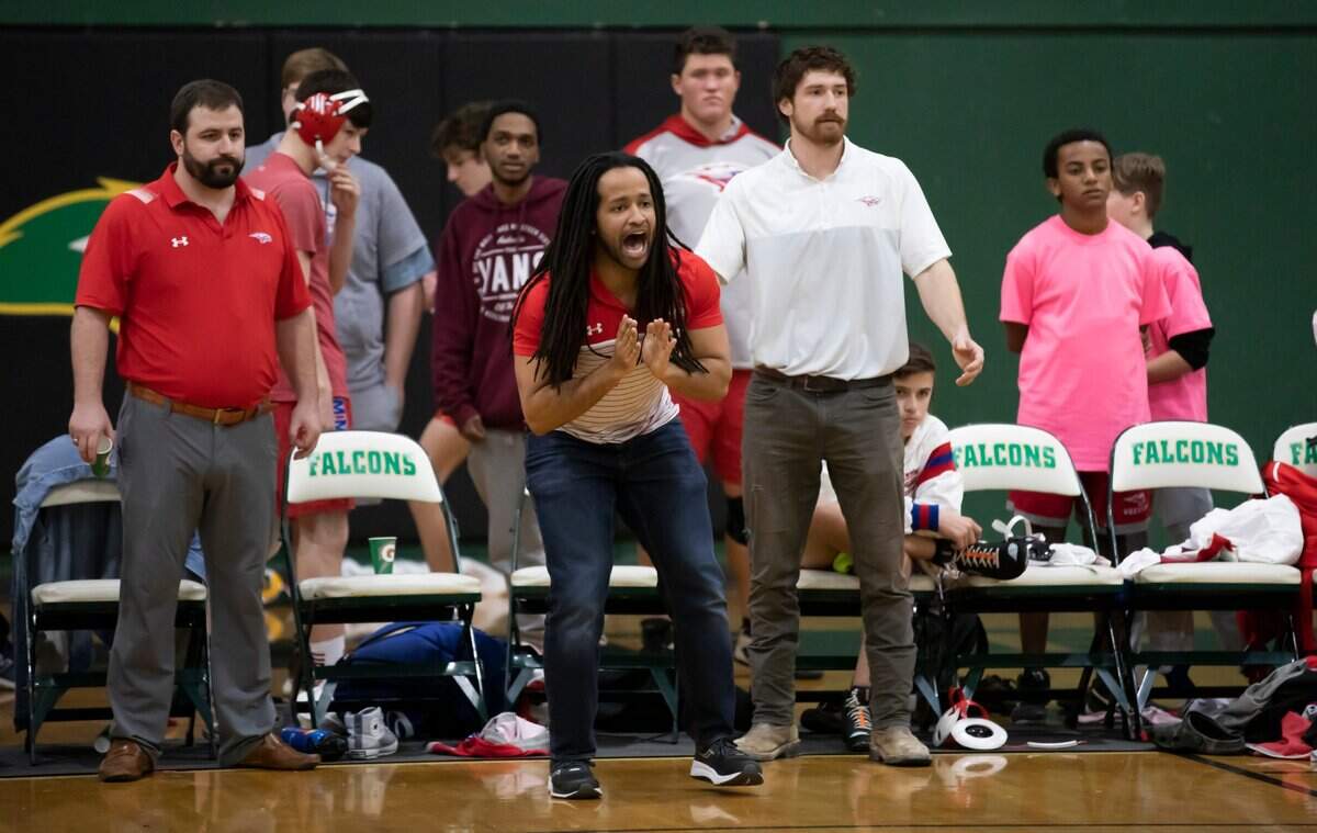 Members of the Hammond School wrestling team cheer during the SCISA 2022 Duals State Wrestling Tournament at Ben Lippen on Saturday, February 5, 2022.