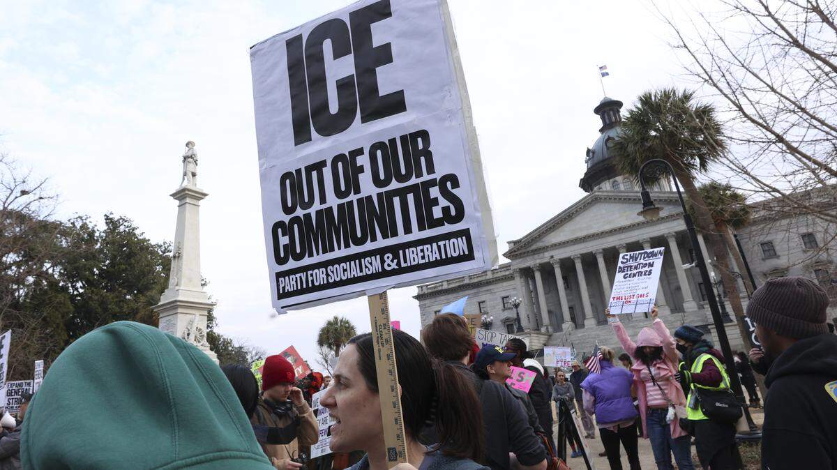 People rally at the South Carolina State House as part of the call for a nationwide shutdown against ICE, on Friday, Jan. 30, 2026.