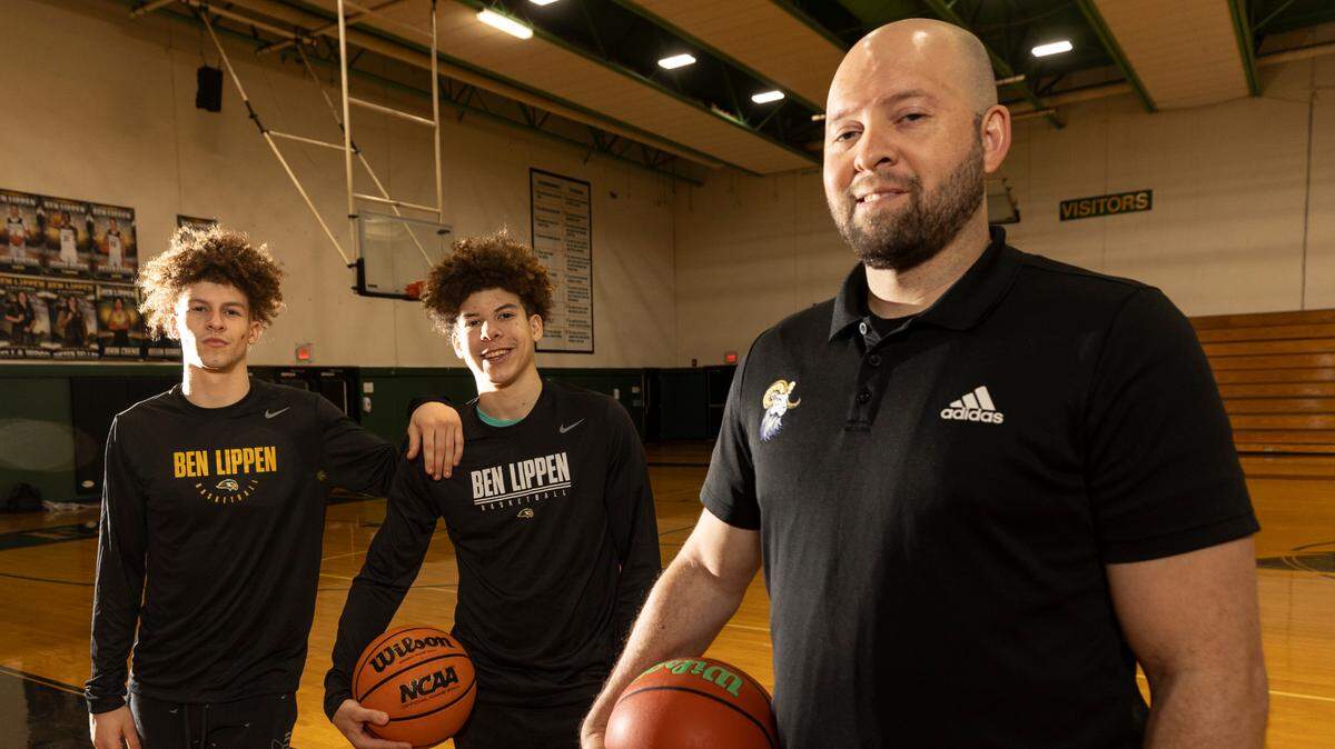 Columbia International basketball coach Tony Stockman coaches his sons, Braysen, left, and Maddox