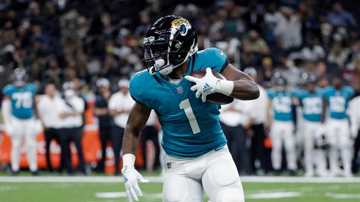 Jacksonville Jaguars running back Travis Etienne (1) carries in the first half of an NFL preseason football game in New Orleans, Monday, Aug. 23, 2021. (AP Photo/Derick Hingle)