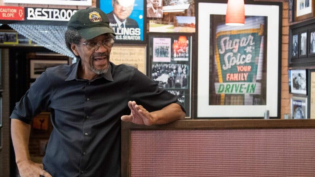 Columbia author and activist Kevin Gray talks to a customer at his Railroad BBQ restaurant on Hampton Street in Columbia in 2022. Gray died on March 7, 2023.