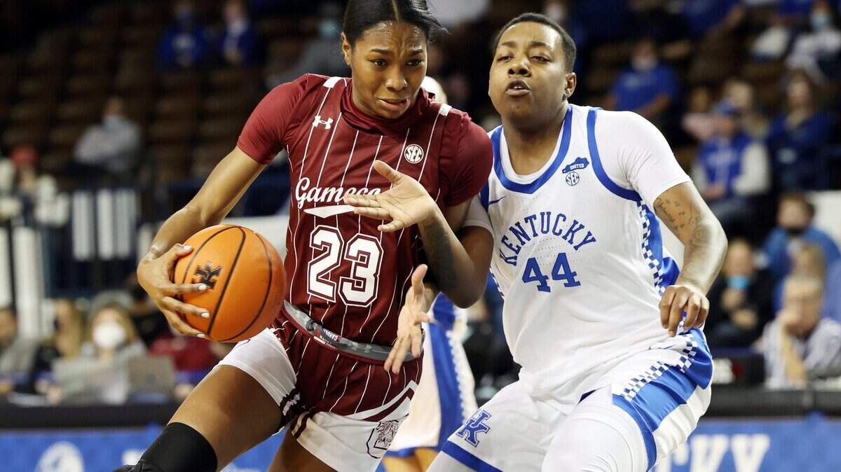 South Carolina’s Bree Hall (23) drives while defended by Kentucky’s Dre’Una Edwards (44) during an NCAA college basketball game in Lexington, Ky., Thursday, Feb. 10, 2022. (AP Photo/James Crisp)