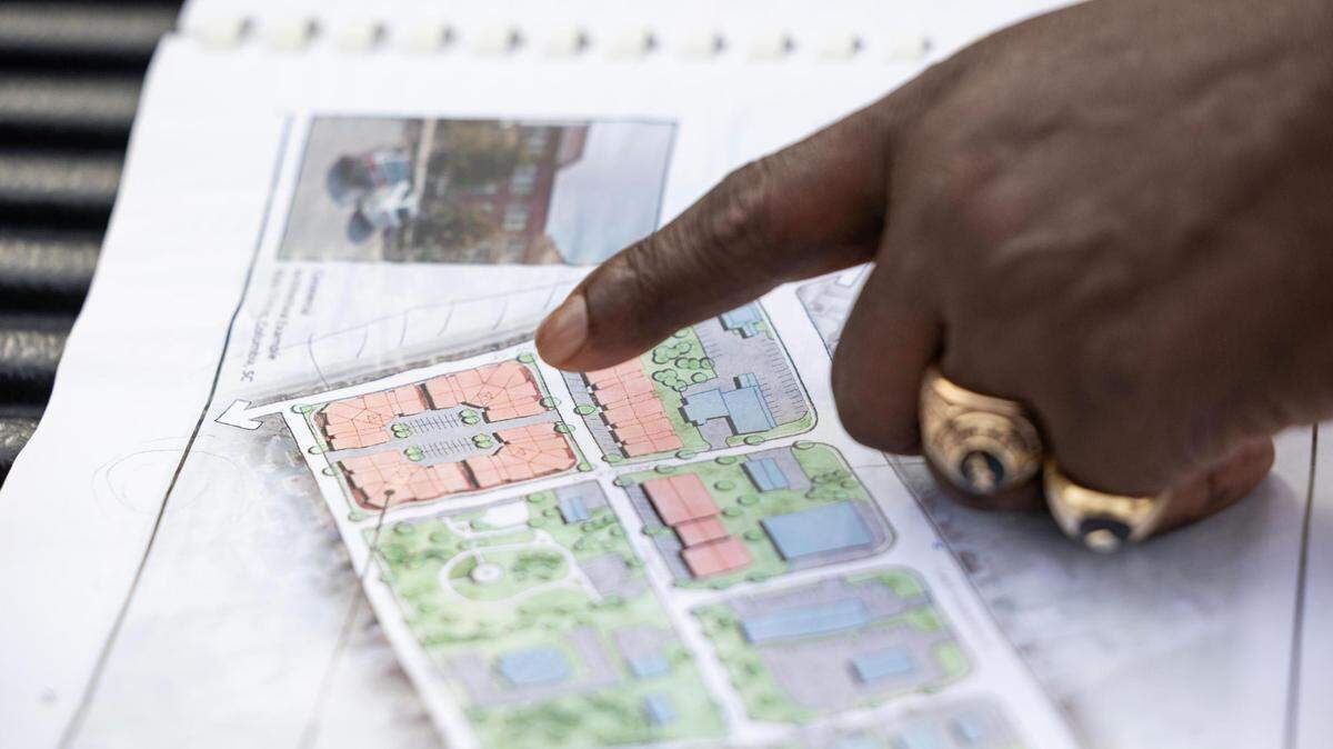 Irmo mayor Barry Walker shows sites laid out in the town’s masterplan for development on Thursday, January 12, 2023. He hoped two homeowners would sell their homes to the city to help move along the development project, but plans to move along without the land their homes are on.