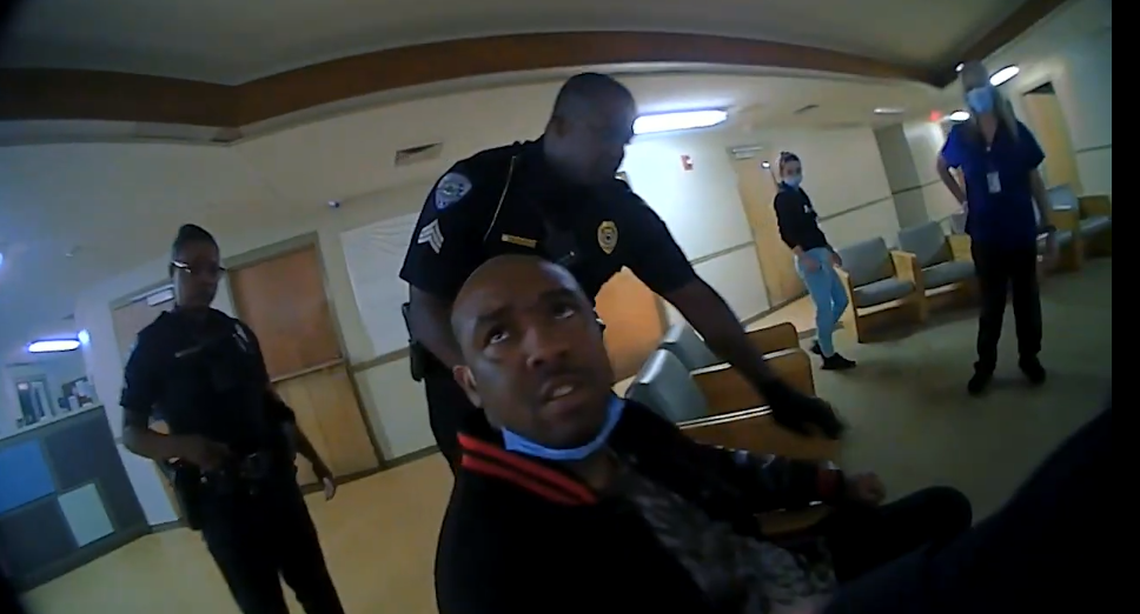 Jamal Sutherland looks up at a North Charleston police officer moments before he is arrested at Palmetto Lowcountry Behavioral Health, where he was receiving mental health treatment on Jan. 4. Sutherland died the following morning inside the Charleston County jail. He was 31.