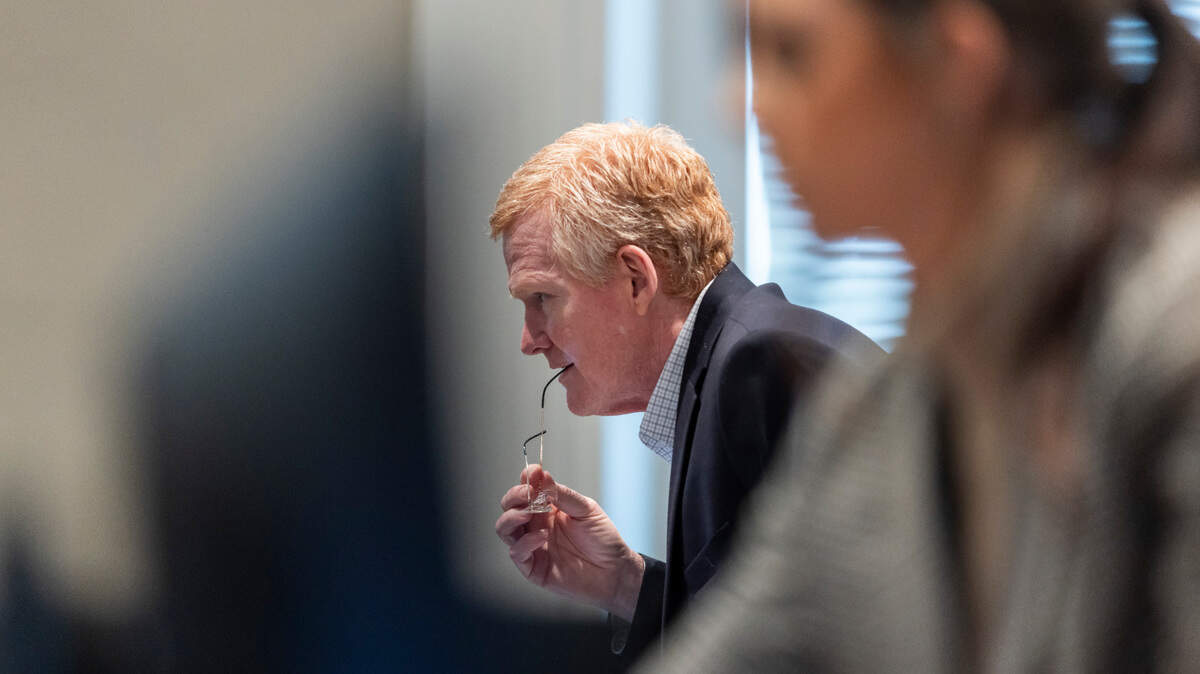 Alex Murdaugh speaks with his attorney during his double murder trial at the Colleton County Courthouse in Walterboro, S.C., Tuesday, Feb. 3, 2023. The 54-year-old attorney is standing trial on two counts of murder in the shootings of his wife and son at their Colleton County home and hunting lodge on June 7, 2021. (Sam Wolfe/The State, Pool)