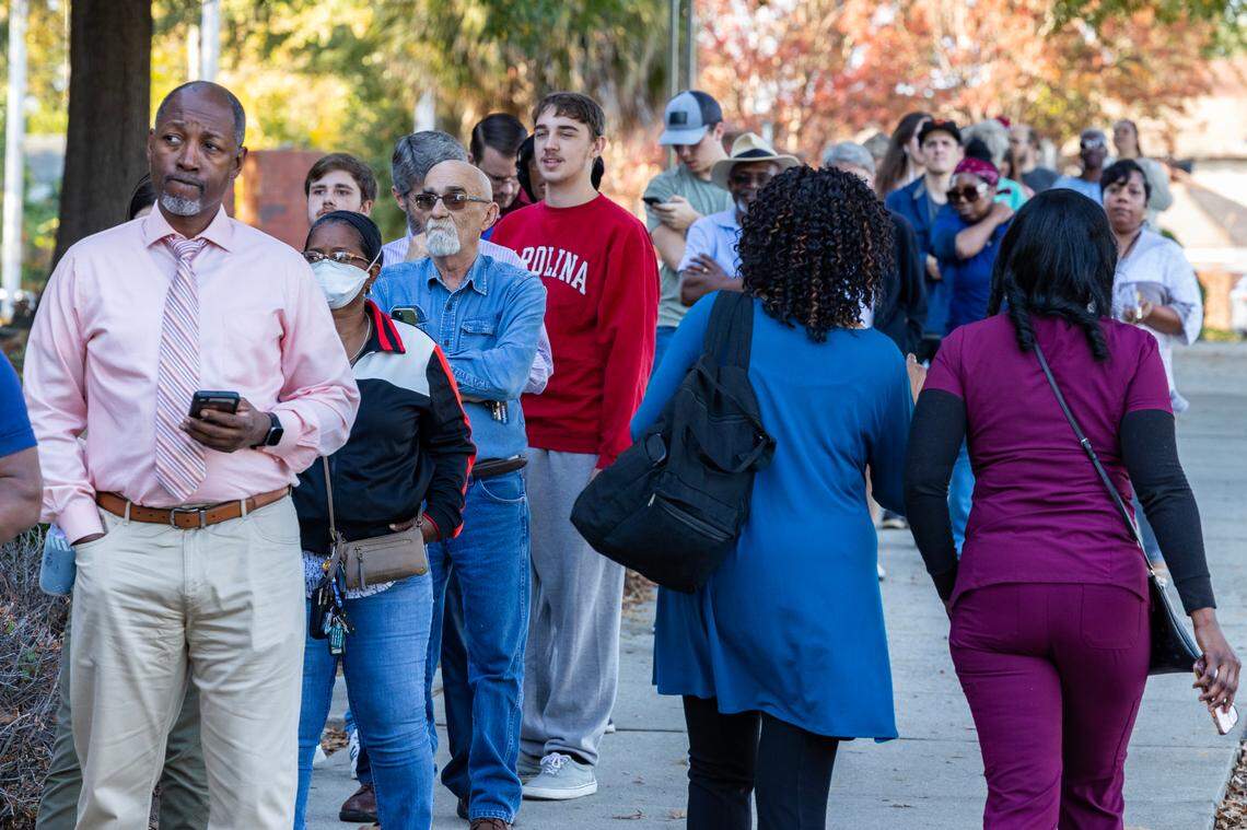 Voters wait in line to vote early in Columbia, South Carolina in the afternoon on Friday, November 4, 2022.
