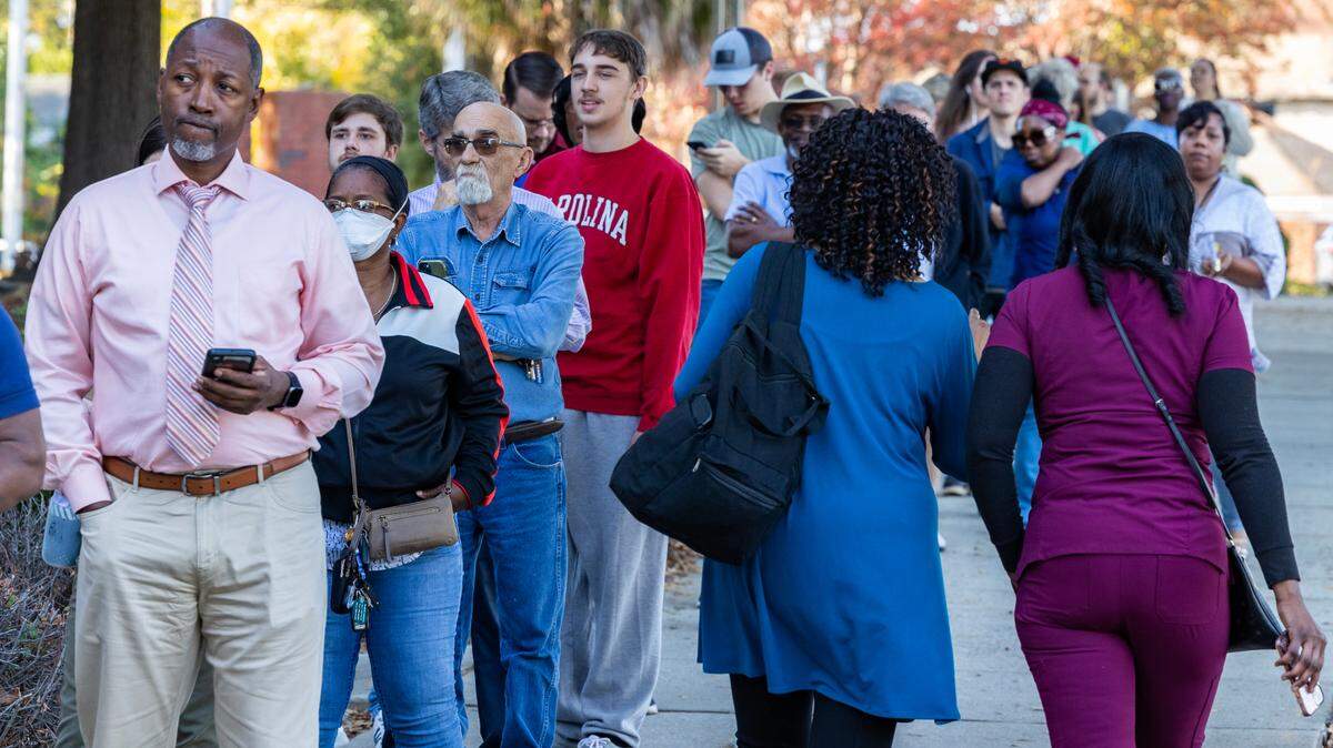 Voters wait in line to vote early in Columbia, South Carolina in the afternoon on Friday, Nov. 4, 2022.
