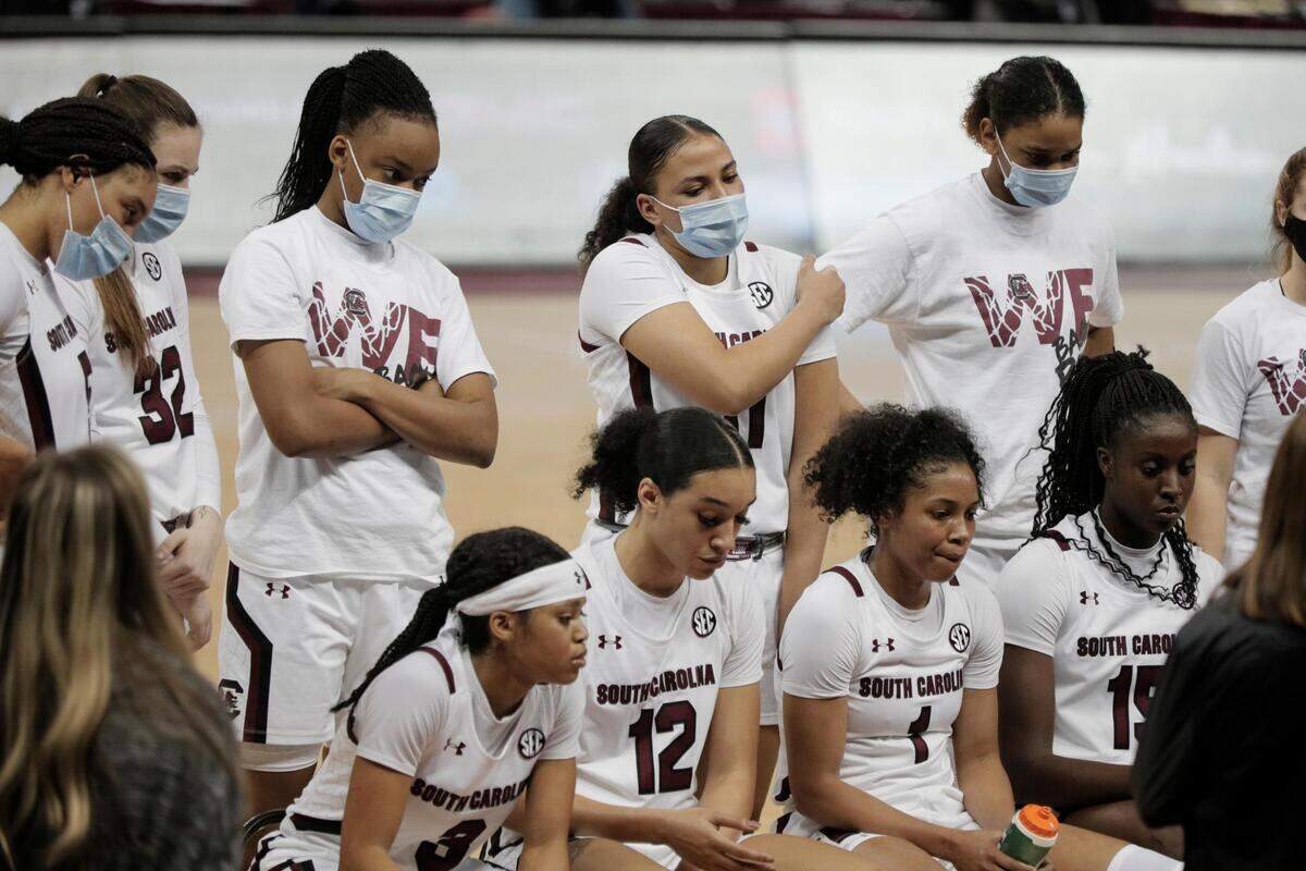The University of South Carolina huddles during their game against the University of Georgia at Colonial Life Arena on Thursday, January 21, 2021.