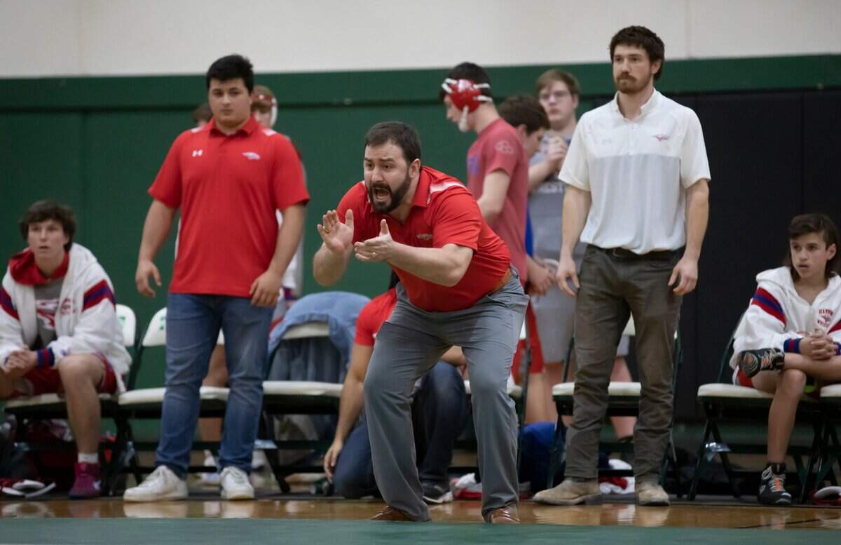 Members of the Hammond School wrestling team cheer during the SCISA 2022 Duals State Wrestling Tournament at Ben Lippen on Saturday, February 5, 2022.