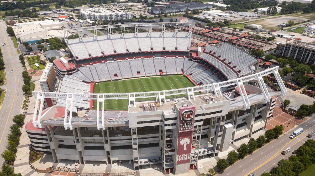 Williams-Brice Stadium is painted Tuesday for the Rivals in Red tour matchup Saturday between Premier League teams Liverpool and Manchester United. The two United Kingdom soccer teams are some of the most popular in America.