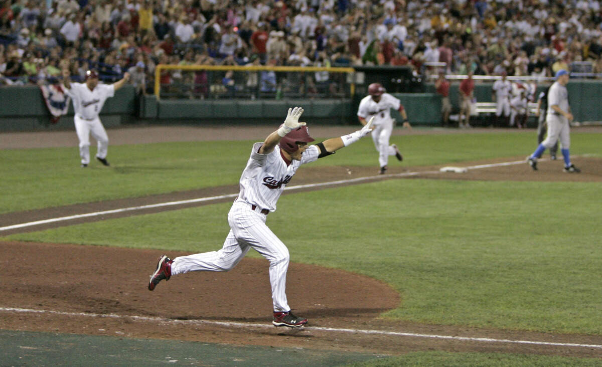 USC’s Whit Merrifield drives in the winning run in the 11th inning during game two of the 2010 College World Series finals between South Carolina and UCLA at Rosenblatt Stadium in Omaha, Neb, Tuesday, June 29, 2010.