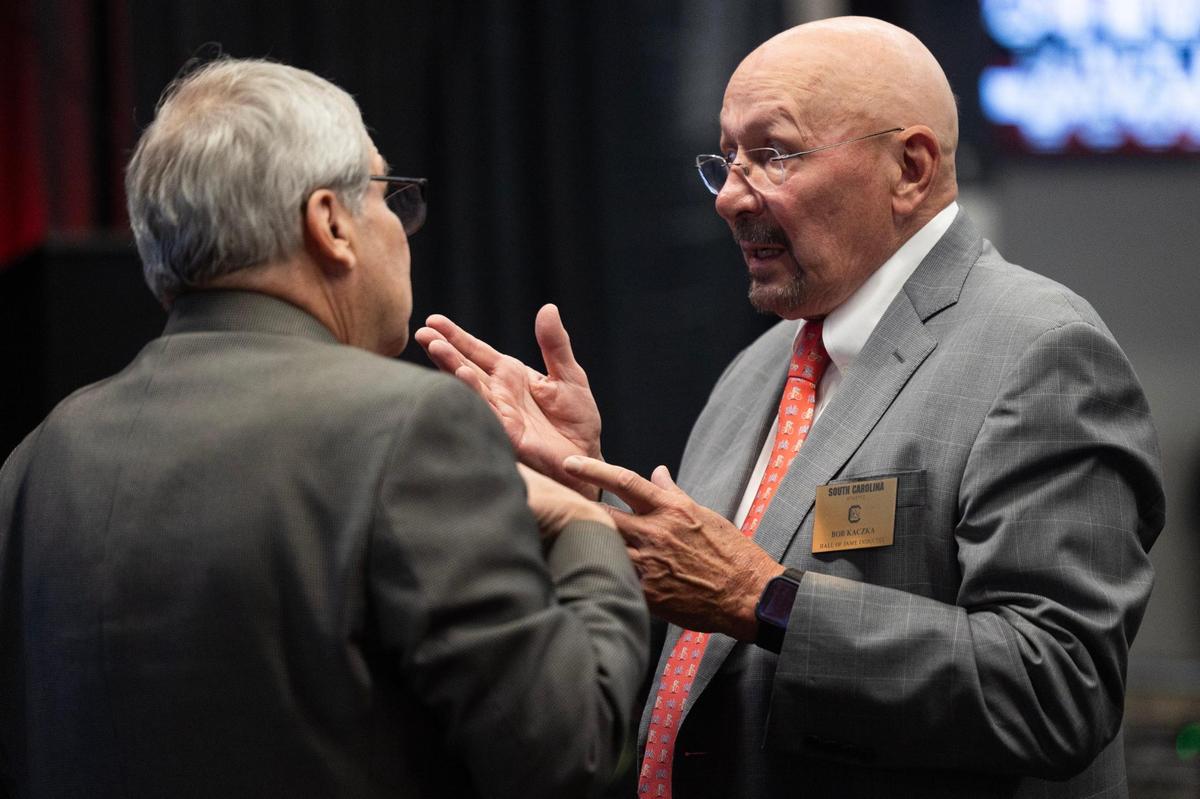 University of South Carolina’s Bob Kaczka, a former Gamecocks track and field star, speaks with fans before he is inducted into the university’s hall of fame at Williams-Brice Arena on Friday, November 1, 2024.