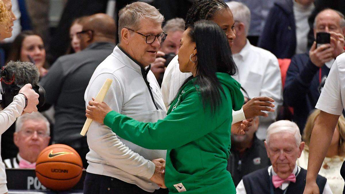 UConn head coach Geno Auriemma and South Carolina head coach Dawn Staley talk before an NCAA college basketball game, Sunday, Feb. 5, 2023, in Hartford, Conn. (AP Photo/Jessica Hill)