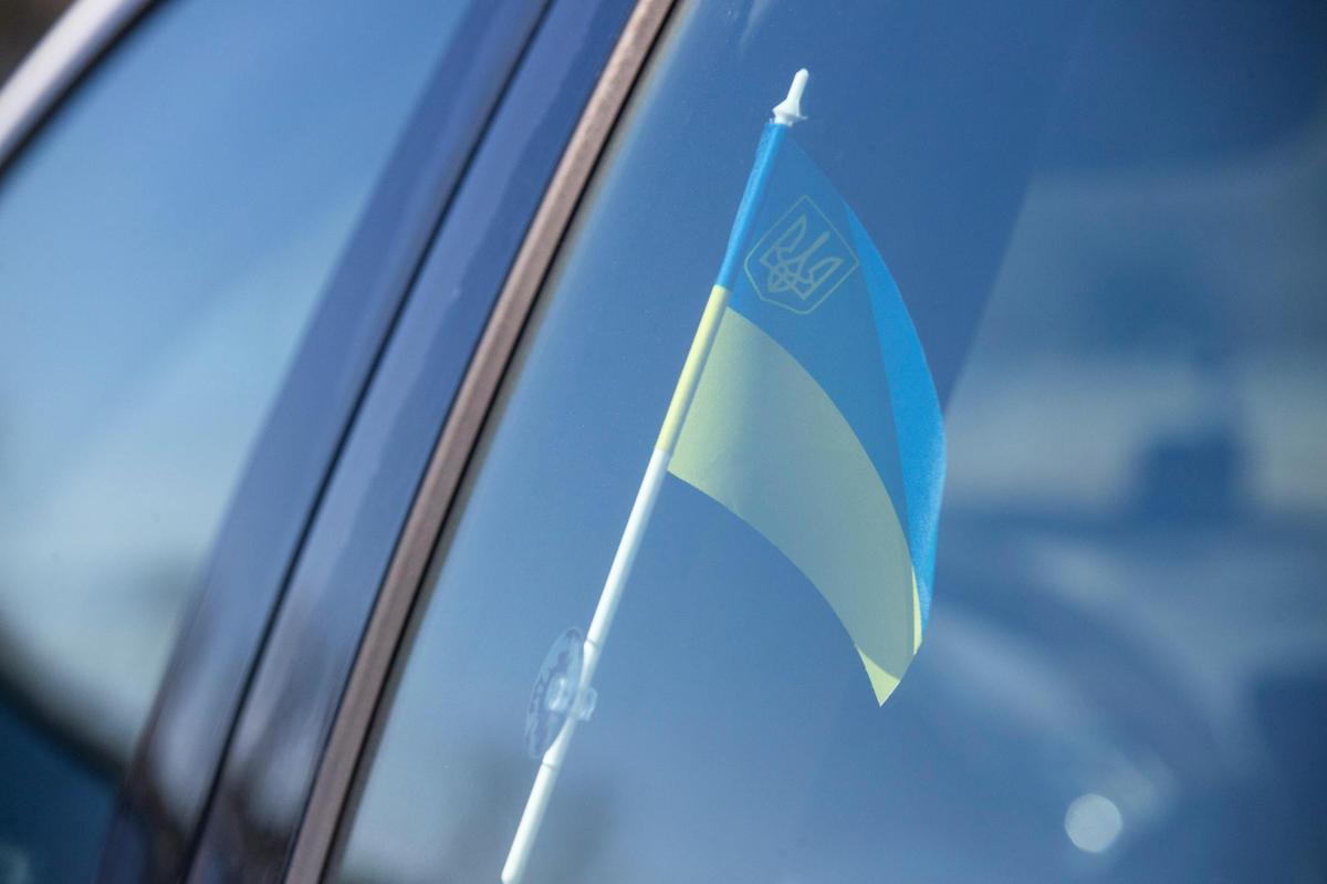Yuriy Petrenko has a Ukrainian flag hanging in his car on Wednesday, March 2, 2022. Petrenko was raised in Ukraine, and his father lives near one Russia’s targets, the nuclear power plant near Nikopol’.