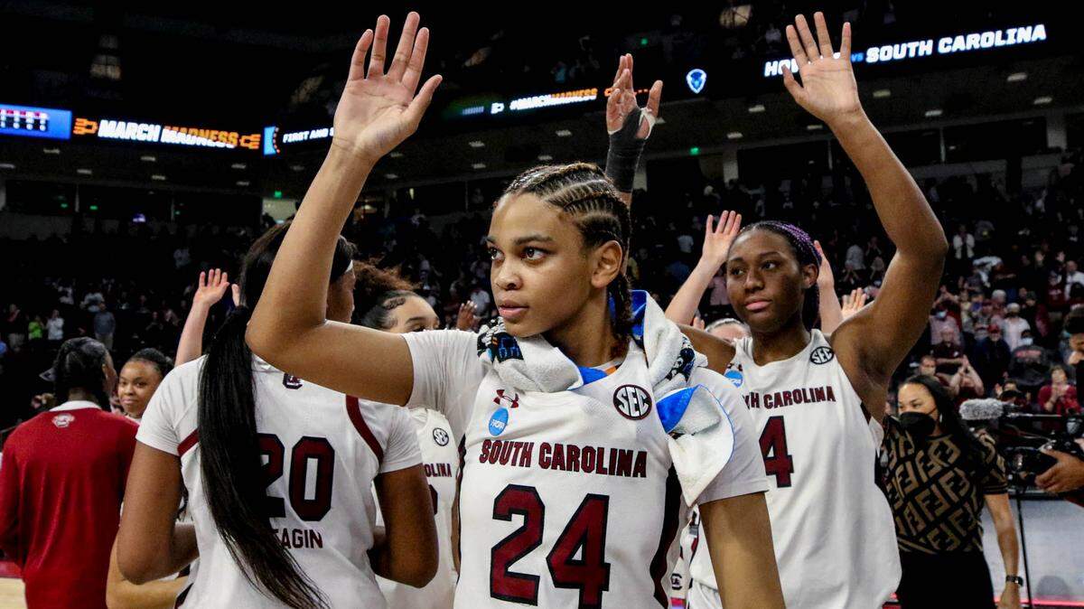 South Carolina’s LeLe Grissett (24) and South Carolina’s Aliyah Boston (4) celebrate after the Gamecocks defeated Howard during the first round of the NCAA Regional tournament on Friday, March 18, 2022 at the Colonial Life Arena.