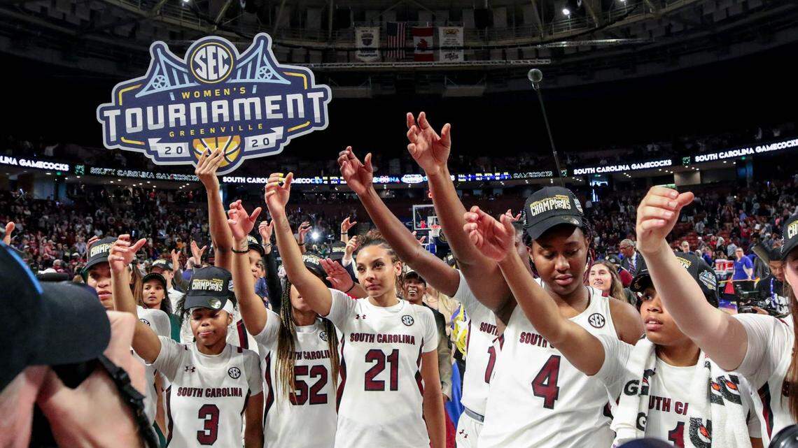 The Gamecocks celebrate in March 2020 after they beat Mississippi State 76-62 to win the SEC Championship game at the Bon Secours Wellness Arena in Greenville.