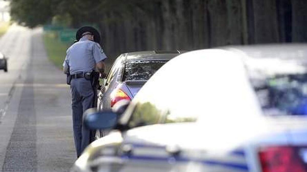 
Lance Cpl. Bradley Shaw of the S.C. Highway Patrol conducts a traffic stop Wednesdsay on Interstate 85 Business in Spartanburg.
