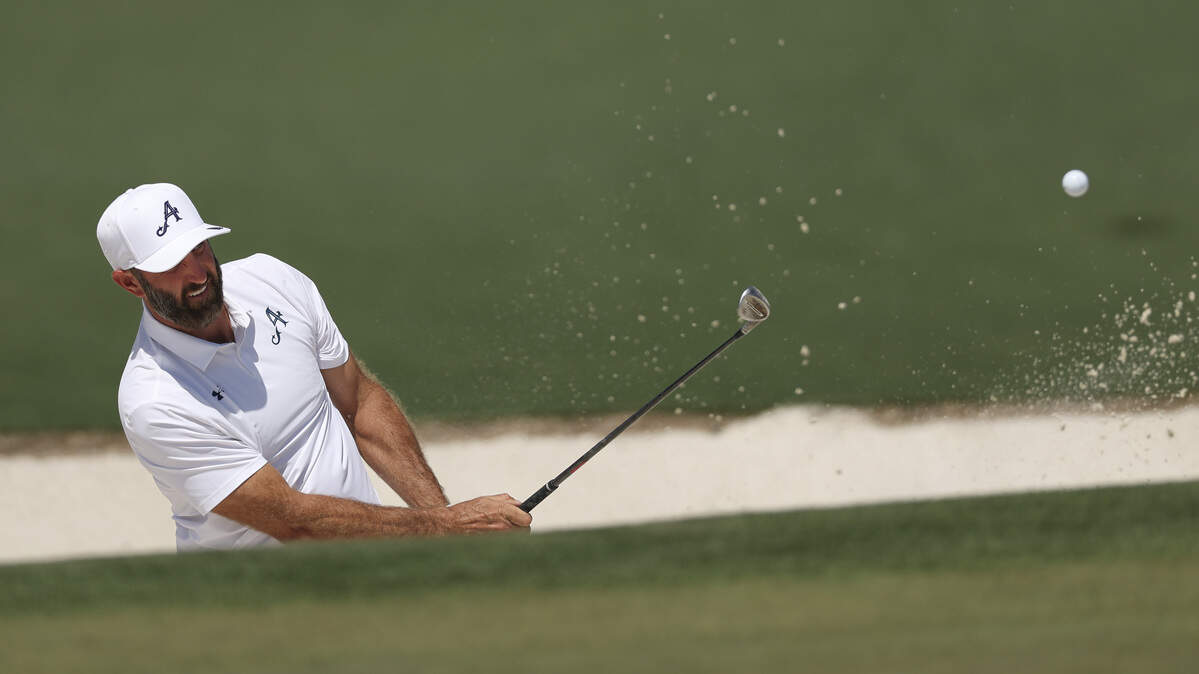 Dustin Johnson of the United States plays a shot from a bunker on the second hole during the third round of the 2026 Masters Tournament at Augusta National Golf Club on April 11, 2026 in Augusta, Georgia.