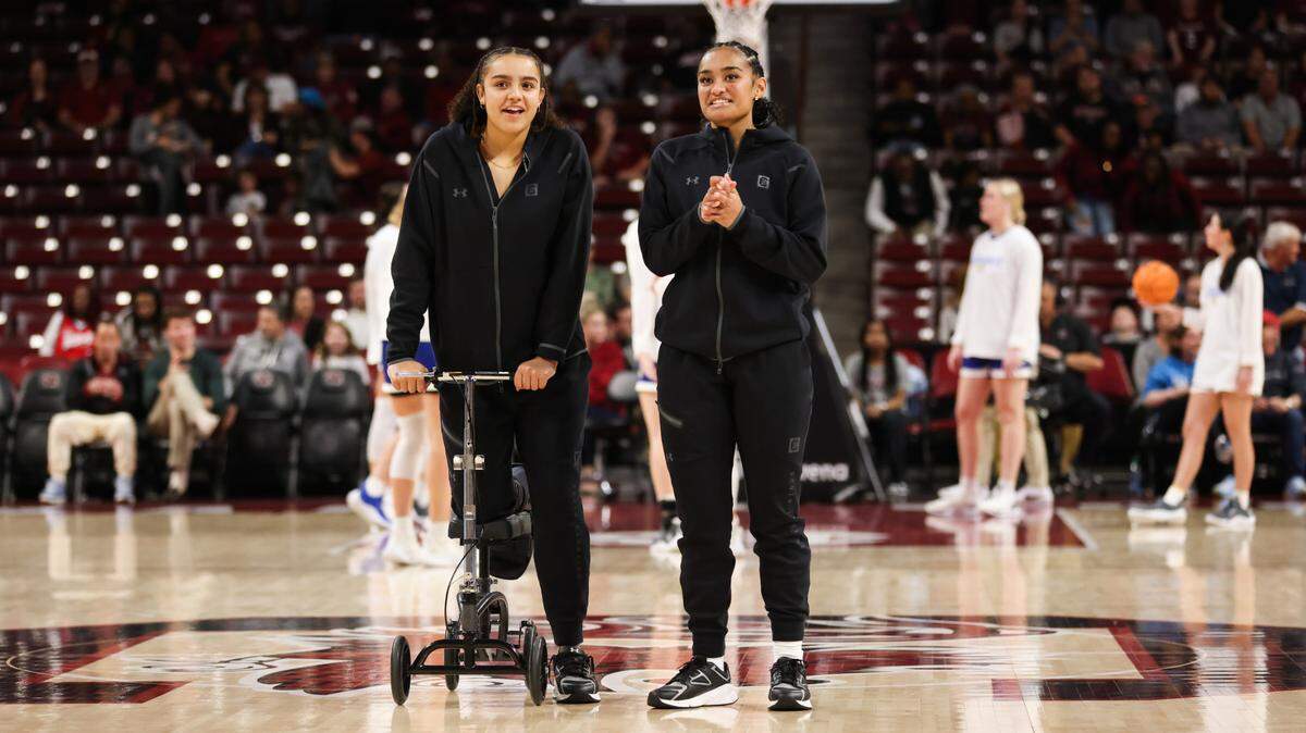 South Carolina guard Tessa Johnson (5) and guard Te-Hina Paopao (0) look on from half court during warmups before the Gamecocks’ game at Colonial Life Arena in Columbia on Monday, November 20, 2023.