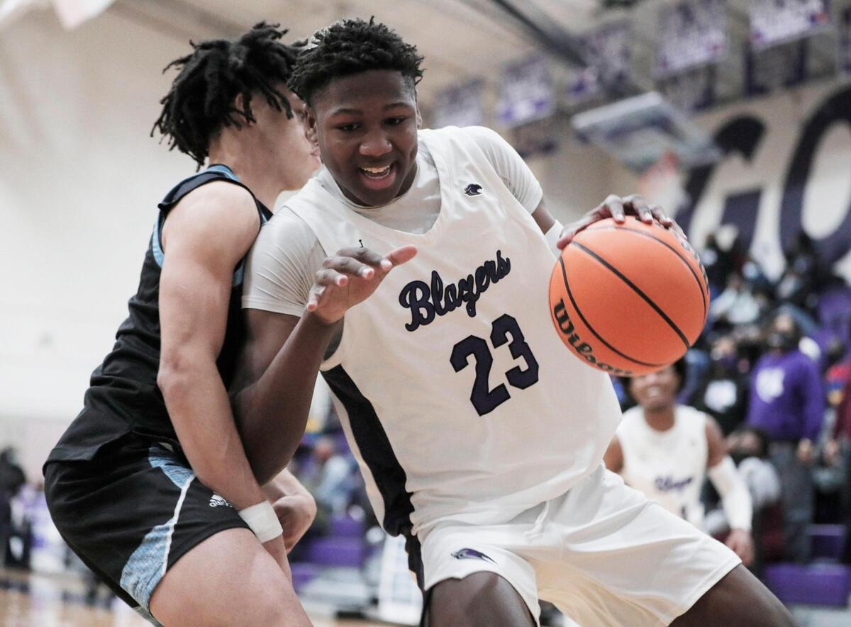 Dorman’s Zay Foster 3 blocks Ridge View’s Gregory Jackson II on Friday, February 26, 2021.