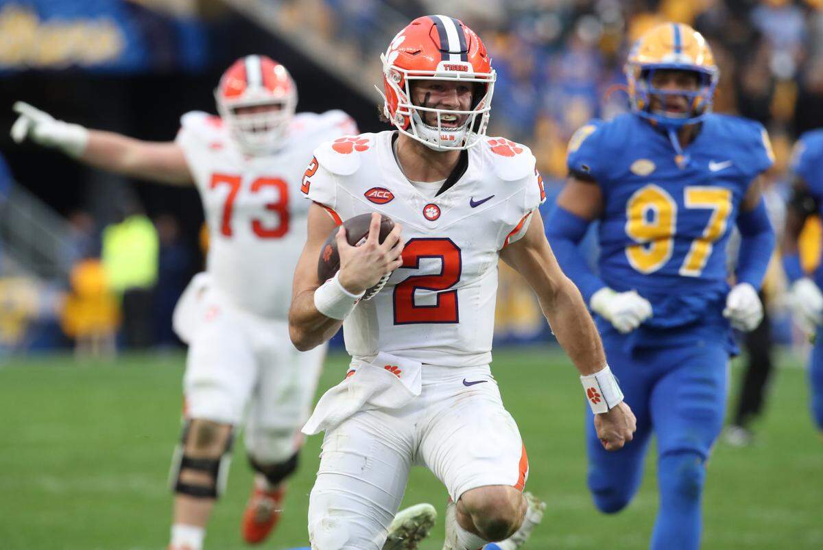 Clemson Tigers quarterback Cade Klubnik (2) runs on his way to scoring a game winning fifty-yard touchdown during the fourth quarter to defeat the Pittsburgh Panthers at Acrisure Stadium. 