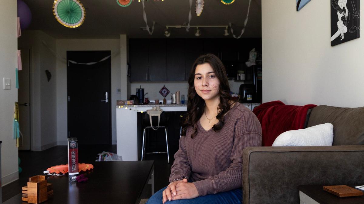 Vanessa Alamio, a freshman studying business at the University of South Carolina, in her campus apartment on Saturday, April 6, 2024. Alamio decorated her apartment at the 650 Lincoln complex while her roommates for a surprise birthday party. After trying several different ways to stay in 650 Lincoln next school year, she will have to move to more expensive university housing further away from the Darla Moore School of Business.
